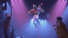 a man playing a guitar on a pole in front of a crowd of people