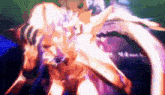 a blurry picture of a person 's face with a purple and orange background