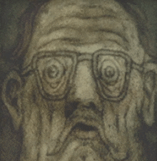 a close up of a man 's face with glasses and a beard .