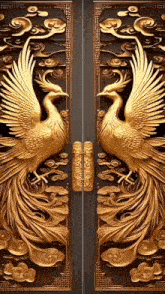 a pair of doors with a sculpture of a phoenix on them