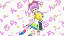 a cartoon girl is holding another girl in her arms with a pattern of letters surrounding them