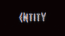the word entity is glowing in a dark room