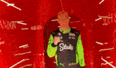 a man in a racing suit with the number 27 on the front