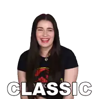 a woman wearing a black shirt with a picture of a dinosaur and the word classic on the bottom