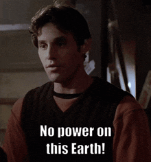 a man says no power on this earth while wearing a sweater vest