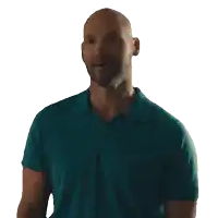 a bald man with a beard is wearing a green polo shirt