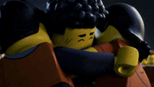 a couple of lego characters hugging each other
