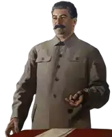 a man with a mustache is standing at a table with his hands outstretched
