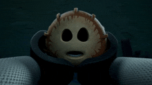 a cartoon character with a smiling face is sitting on a couch