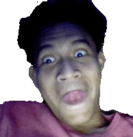 a man in a pink shirt making a funny face with his tongue out