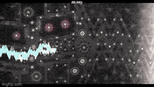 a video game with a lot of circles and stars on a black background .