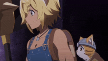 a girl with overalls and a cat on her back