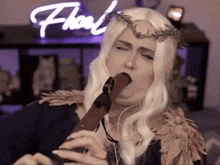 a woman playing a flute in front of a neon sign that says float