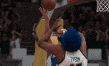 a basketball player with the name tyson on the back