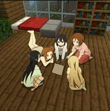 a group of anime girls are sitting on the floor in a room