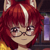 a girl with red hair and glasses is smiling