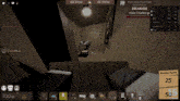 a screenshot of a video game shows a room with a bed and a table .