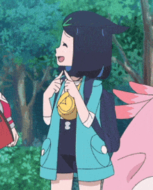 a girl in a blue jacket with the letter a on her chest