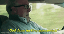 a man with glasses is driving a car and says `` god damn fucking autocorrect '' .