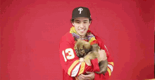 Johnny Gaudreau Holding Puppy GIF - Johnny Gaudreau Holding Puppy Dog GIFs