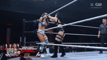 two women are wrestling in a ring with the words women 's north american championship
