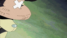 a cartoon character with a white cross on his nose