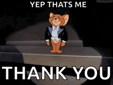 jerry from tom and jerry is wearing a tuxedo and bow tie and is standing on a stage .