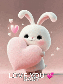 a bunny rabbit holding a pink heart with the words love you baby below it