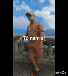 a man standing on a balcony with the words to nem ai written on the bottom