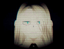 a drawing of a woman 's face is displayed on a dark background