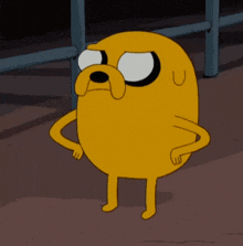 a cartoon character named jake from adventure time stands with his arms crossed