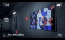 a video camera is recording a colorful painting in full hd 60fps