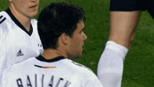 a soccer player with the name ballack on his shirt