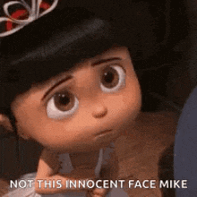 a little girl from despicable me is wearing a tiara and looking at the camera with a sad look on her face .