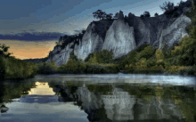 Mountain & Sunset Reflection In Water GIF - Mountain Reflection Water GIFs