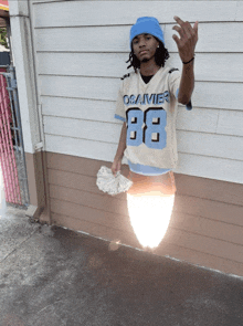 a man wearing a jersey that says osavier on the front