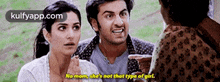 a man and a woman are talking to a woman in a movie and the woman is pointing at the man .