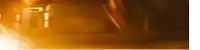 a blurred image of a person standing in a dark room with a clock .