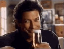 Jeff Goldblum Holsten Pils GIF - Jeff Goldblum Holsten Pils Cheers GIFs