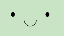 a cartoon drawing of a green face with a smile on it