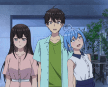 a boy and two girls standing next to each other