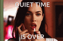 a woman is talking on a cell phone while holding a lighter in her hand with the words quiet time is over above her