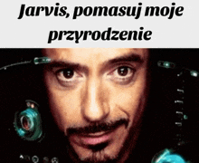 a close up of a man 's face with a caption that says jarvis