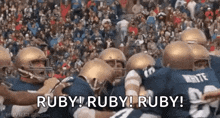 a group of football players are standing in a huddle with the words ruby ruby ruby written in the foreground