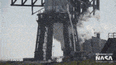 a picture of a rocket being launched by nasa spaceflight