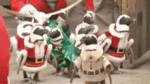 Santa'S Elves GIF - Santas Elves Elves Penguins GIFs
