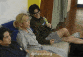 a group of people sitting on a couch with the hashtag allaboutklang