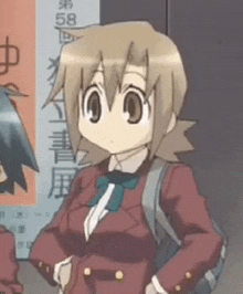 a girl in a school uniform with a backpack is standing in front of a sign with chinese writing .