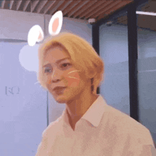a man with bunny ears on his head
