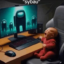 a baby is crying while sitting in front of a computer monitor .